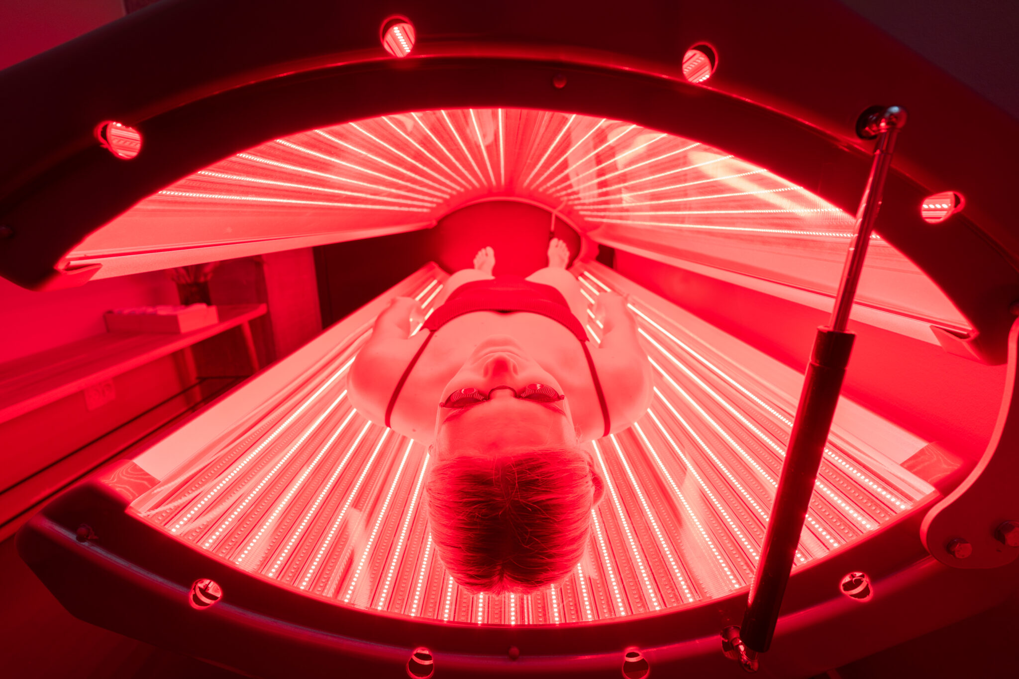 A person undergoing red light therapy